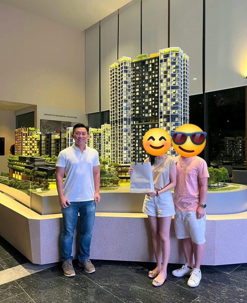 Happy clients collecting keys with Daniel Low